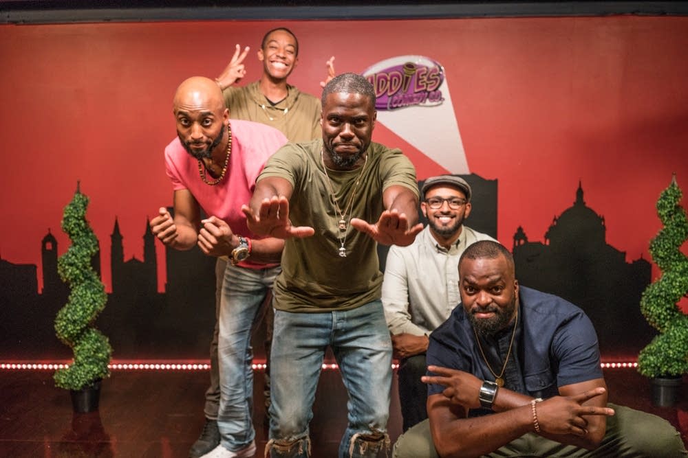 Baddies Comedy crew posing on stage