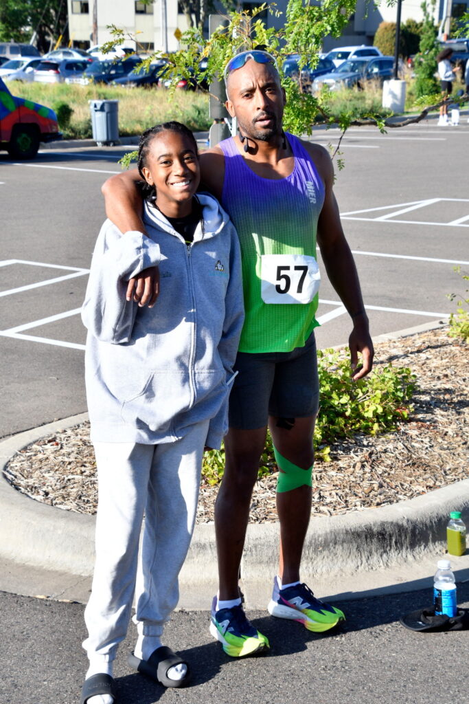 Bruce Leroy Williams with family after finishing the Push Triathlon
