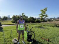 Bruce Leroy Williams in his race kit beside his bike on the morning of the Push Triathlon at V3